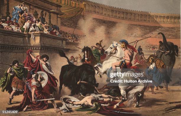 Circa 100 BC, Gladiators riding elephants and horses battle a bull in a Roman amphitheatre. Original Artwork: A print by Professor Wagner.