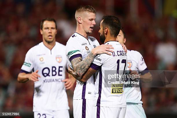 Andy Keogh of Perth Glory celebrates with Diego Castro after scoring a goal during the round 21 A-League match between the Western Sydney Wanderers...