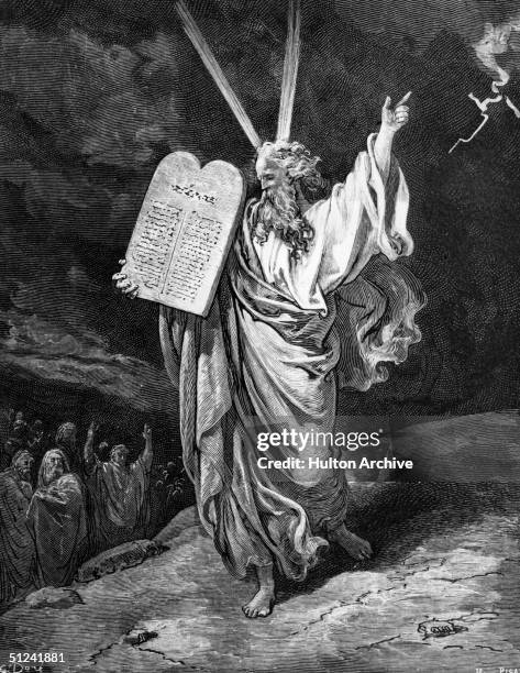 Circa 1200 BC, Moses carrying the stone upon which the Ten Commandments are engraved.