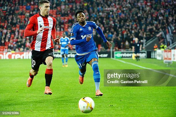 Oscar de Marcos of Bilbao and Georges Kevin Nkoudou of Marseille during the UEFA Europa League Round of 32, Second Leg match between Athletic Bilbao...