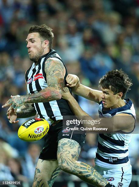 Dane Swan of the Magpies marks infront of Andrew Mackie of the Cats during the 2016 NAB Challenge match between the Geelong Cats and the Collingwood...