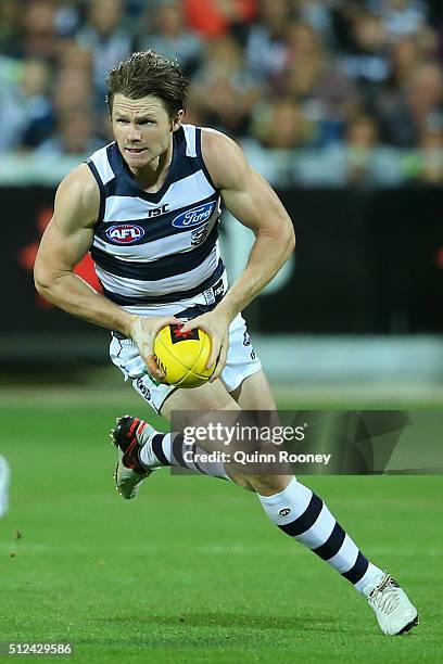 Patrick Dangerfield of the Cats looks to pass the ball during the 2016 NAB Challenge match between the Geelong Cats and the Collingwood Magpies at...