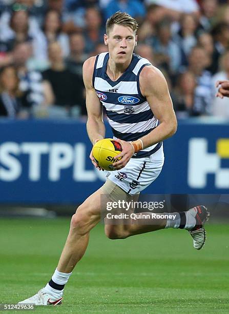 Mark Blicavs of the Cats looks to pass the ball during the 2016 NAB Challenge match between the Geelong Cats and the Collingwood Magpies at Simonds...