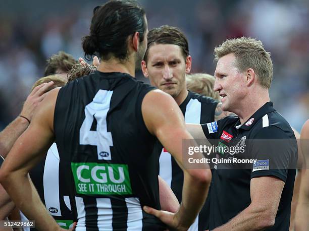 Nathan Buckley the coach of the Magpies talks to his players during the 2016 NAB Challenge match between the Geelong Cats and the Collingwood Magpies...