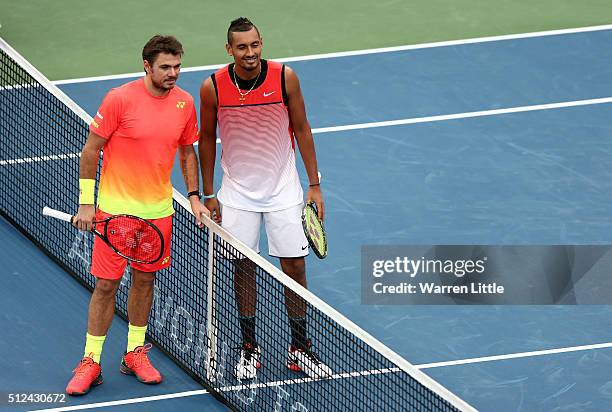 Stan Wawrinka of Switzerland and Nick Kyrgios of Australia pose ahead of their semi final match on day seven of the ATP Dubai Duty Free Tennis...