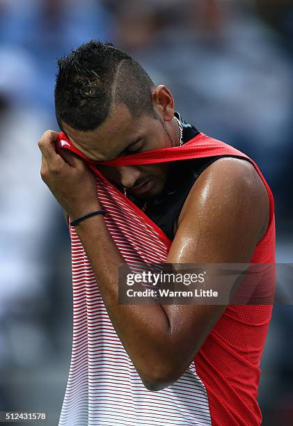 Nick Kyrgios of Australia wipes his brow during his semi final match against Stan Wawrinka of Switzerland on day seven of the ATP Dubai Duty Free...