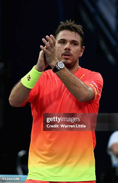 Stan Wawrinka of Switzerland acknowledges the crowd after winning his semi final match as Nick Kyrgios of Australia retires injured on day seven of...
