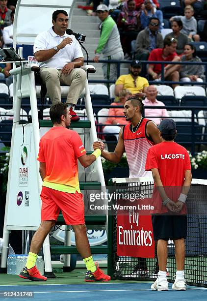 Nick Kyrgios of Australia conceeds his semi final match against Stan Wawrinka of Switzerland after injury on day seven of the ATP Dubai Duty Free...