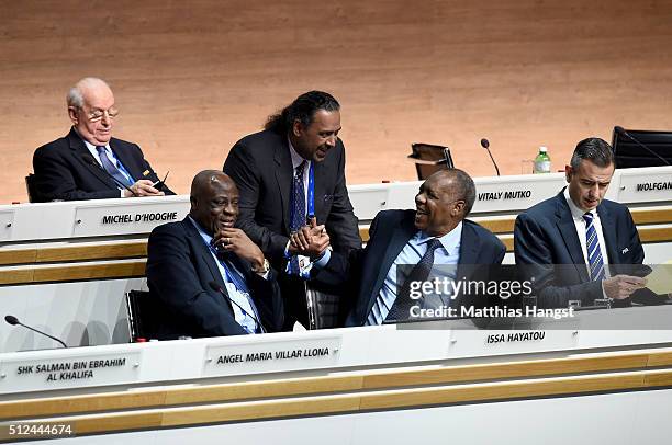 Executive Committee member Sheikh Ahmad Al Fahad Al Sabah shakes hands with FIFA Acting President Issa Hayatou during the Extraordinary FIFA Congress...