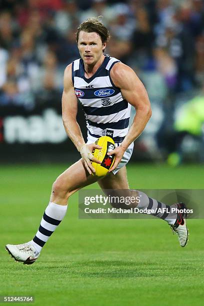 Patrick Dangerfield of the Cats runs with the ball during the 2016 NAB Challenge match between the Geelong Cats and the Collingwood Magpies at...