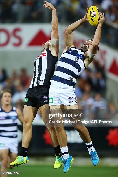 Shane Kersten of the Cats marks the ball against Ben Sinclair of the Magpies during the 2016 NAB Challenge match between the Geelong Cats and the...