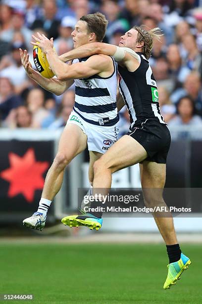 Lincoln McCarthy of the Cats marks the ball against Ben Sinclair of the Magpies during the 2016 NAB Challenge match between the Geelong Cats and the...