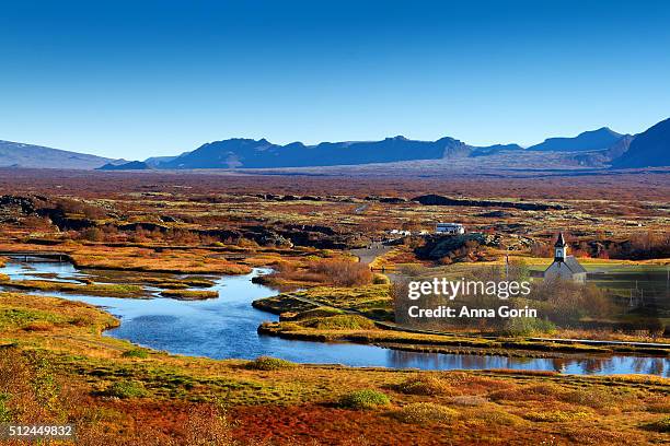 thingvallakirkja church along banks of oxara river in thingvellir national park, iceland, autumn afternoon - thingvellir stock pictures, royalty-free photos & images