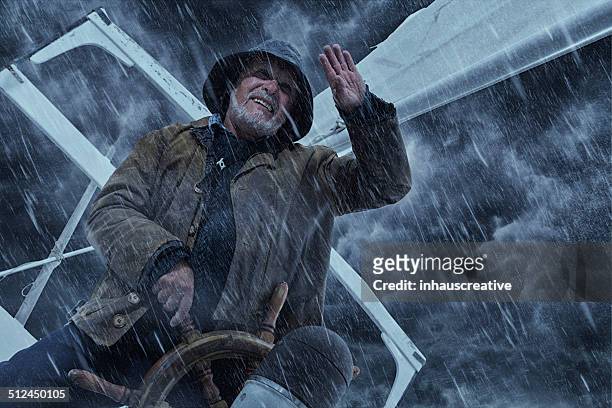 old man and the sea - boat helm stock pictures, royalty-free photos & images