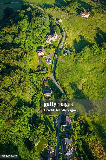 aerial view over country village idyllic summer landscape green fields - british culture garden stock pictures, royalty-free photos & images