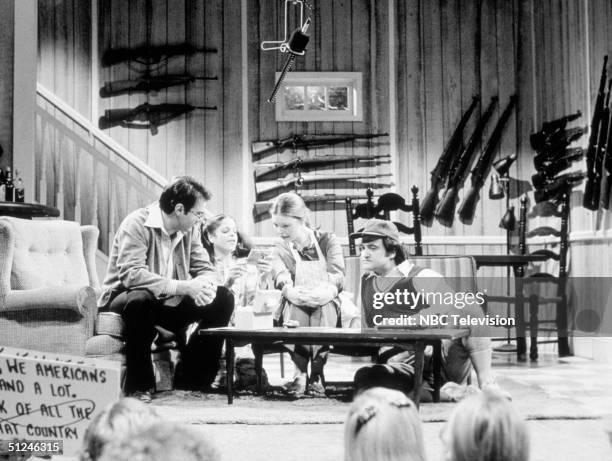 Dan Akroyd, Gilda Radner , Jane Curtin, and John Belushi performing the Lupner skit on the set of Saturday Night Live in New York City.