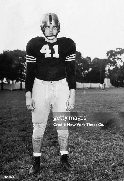 Circa 1945, American football player Glenn Davis, aka 'Mr. Outside', an All American halfback in the Army, poses on the field in his uniform.