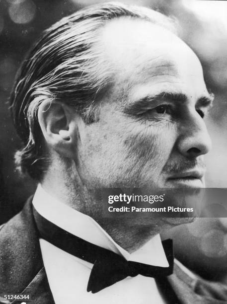 Headshot still of American actor Marlon Brando as Don Vito Corleone in director Francis Ford Coppola's film 'The Godfather' based on the novel by...