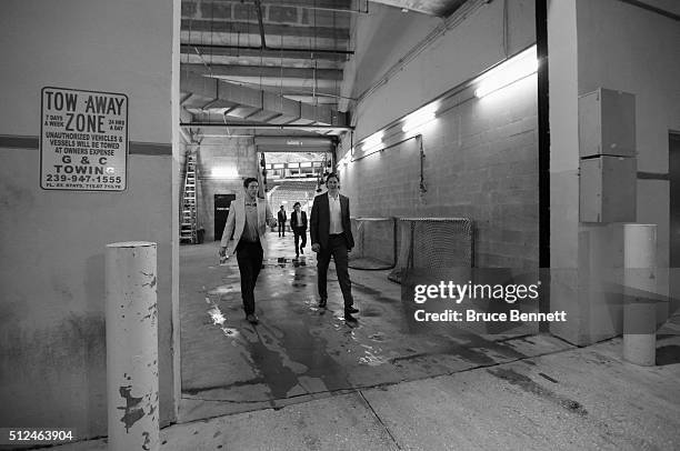 Eric Baier and Rory Rawlyk of Orlando Solar Bears head for the bus ride home following the game against the Florida Everblades at the Germain Arena...