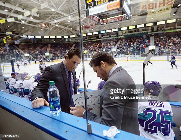 John Snowden and Anthony Noreen of the Orlando Solar Bears discuss strategy on a road trip to play the Florida Everblades at the Germain Arena on...