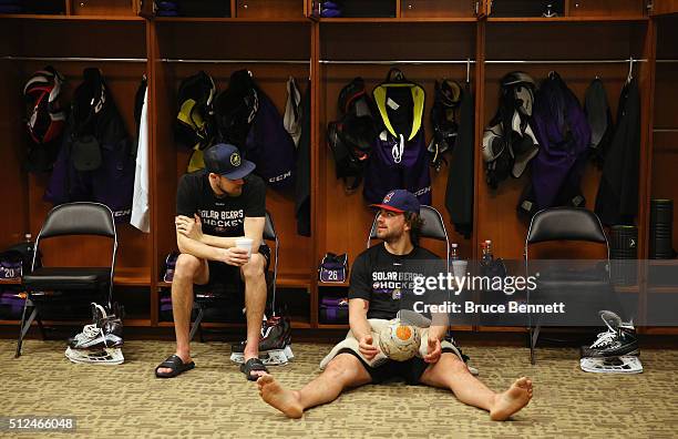 Spencer McAvoy and Zach Bell of Orlando Solar Bears wait for practice at the Amway Center on February 13, 2016 in Orlando, Florida.