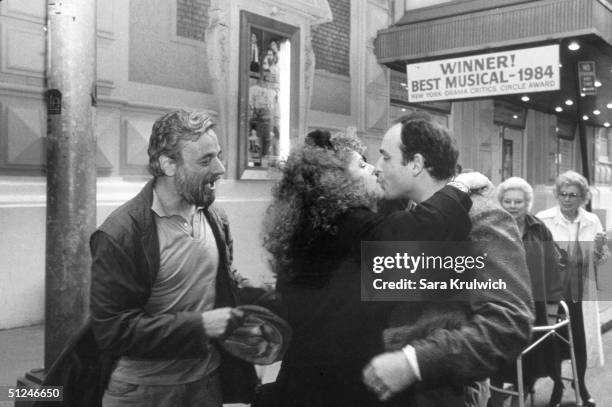 24th April 1985, American composer Stephen Sondheim, American actor Bernadette Peters, and American playwright James Lapine, outside their Pulitzer...