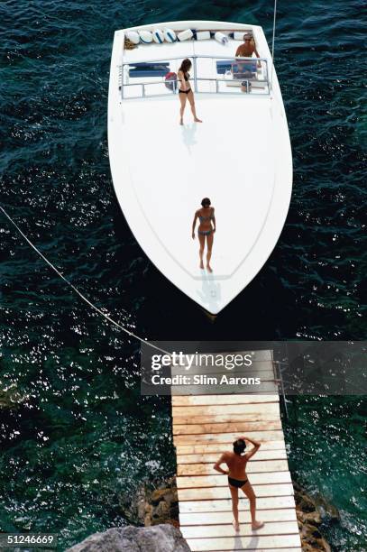 Magnum motorboat belonging to Count Filippo Theodoli arrives at the private jetty of the Il Pellicano Hotel in Porto Ercole, Italy.