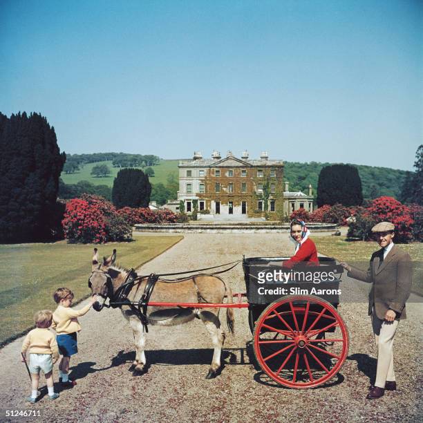 The Marquess and Marchioness of Waterford and their elder son, the Earl of Tyrone, in the grounds of their home, Curraghmore, County Waterford,...