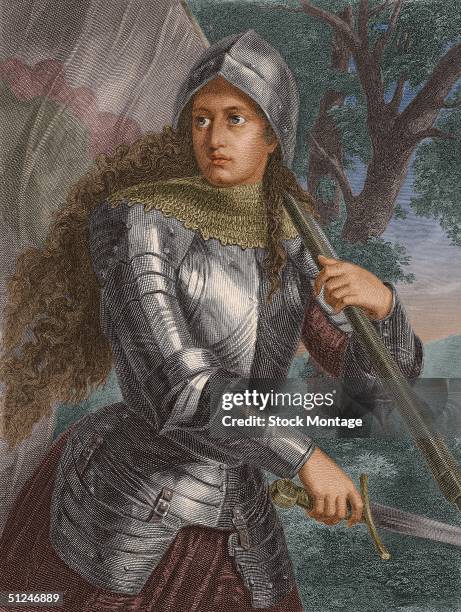 Joan of Arc , French saint and national heroine who led her troops to victory over the British during the Hundred Years War, carrying a sword and a...