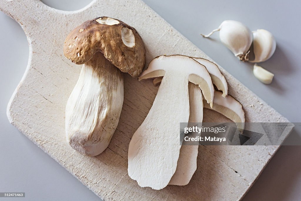 Boletus edulis mushroom on cutting board