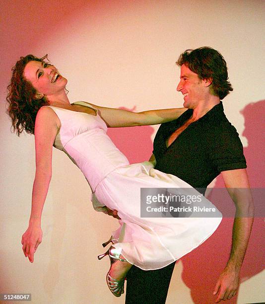 Kym Valentine and Josef Brown pose at the photocall for the stage world premiere of "Dirty Dancing" at the Tattersall Club August 31, 2004 in Sydney,...