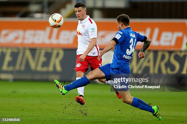 Robinas Krausse of Paderborn challenges Diego Demme of Leipzig during the 2. Bundesliga match between SC Paderborn and RB Leipzig at Benteler Arena...