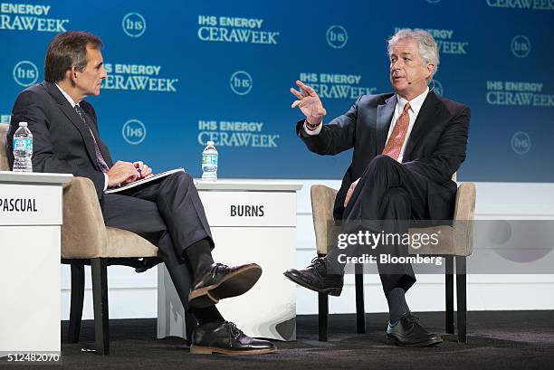 William Burns, president of the Carnegie Endowment for International Peace, right, speaks as Carlos Pascual, senior vice president of Global Energy...