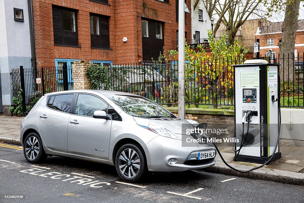 Go Ultra Low Electric Vehicle on charge on a London street