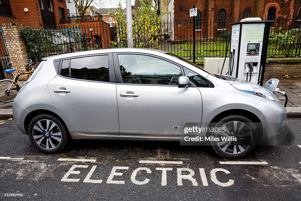 Go Ultra Low Electric Vehicle on charge on a London street