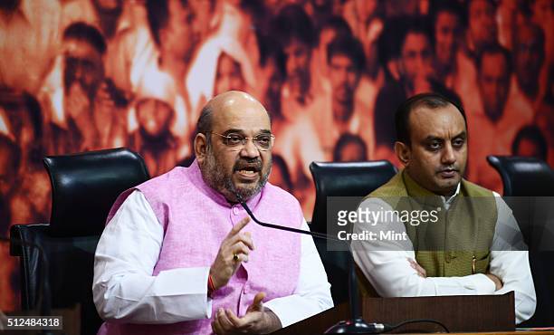 President Amit Shah with BJP leader Sudhanshu Trivedi conducting press conference at the BJP headquarters at 11 Ashoka Road marking one year of...