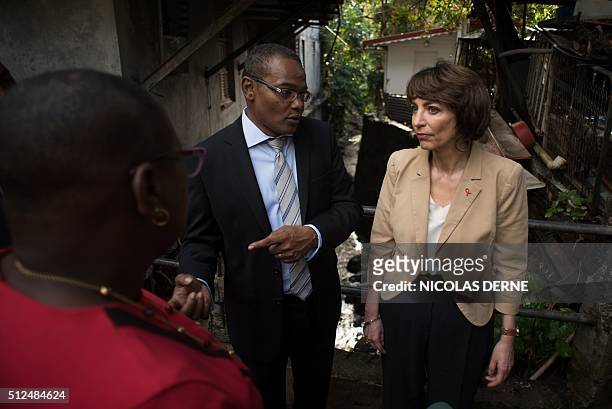 French minister for Social Affairs, Health and Women's Rights Marisol Touraine , flanked by Fort de France's Mayor Didier Laguerre , visits the...