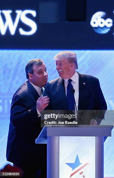Republican presidential candidates New Jersey Governor Chris Christie and Donald Trump visit during a commercial break in the Republican presidential...