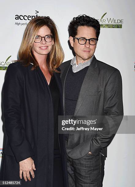 Director J.J. Abrams and his wife Katie McGrath arrive at the 2016 Oscar Wilde Awards at Bad Robot on February 25, 2016 in Santa Monica, California.