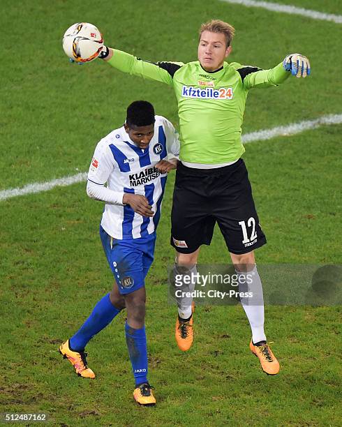 Boubacar Barry of Karlsruher SC and Jakob Busk of 1 FC Union Berlin during the game between Union Berlin and Karlsruher SC on February 26, 2016 in...