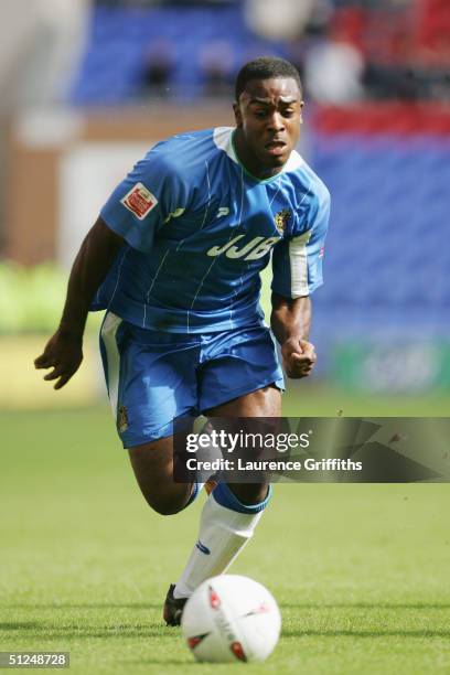 Nathan Ellington of Wigan Athletic runs with the ball during the Coca-Cola Championship match between Wigan Athletic and Cardiff City at The JJB...