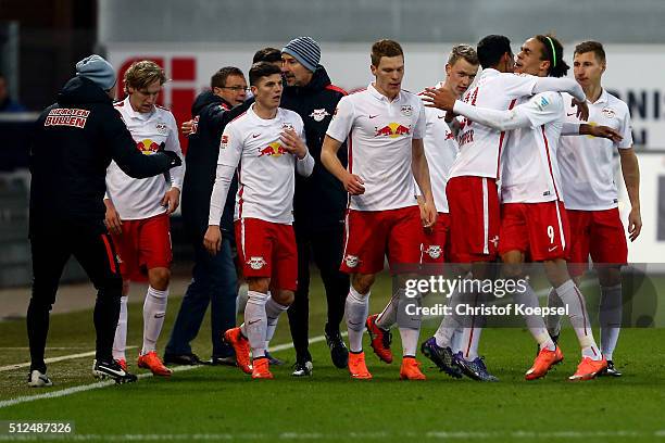 Marvin Compper of Leipzig celebrates the first goal wth Yussuf Poulsen of Leipzig during the 2. Bundesliga match between SC Paderborn and RB Leipzig...