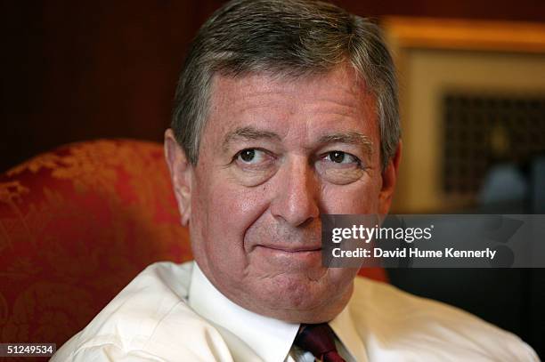 Attorney General John Ashcroft meets with his staff in his conference room at the Department of Justice August 26, 2004 in Washington, DC.