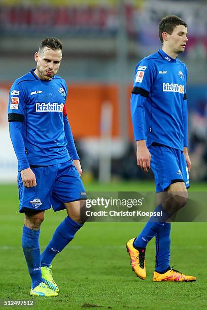 Marvin Bakalorz and Nicklas Helenius Jensen of Paderborn look dejected during the 2. Bundesliga match between SC Paderborn and RB Leipzig at Benteler...