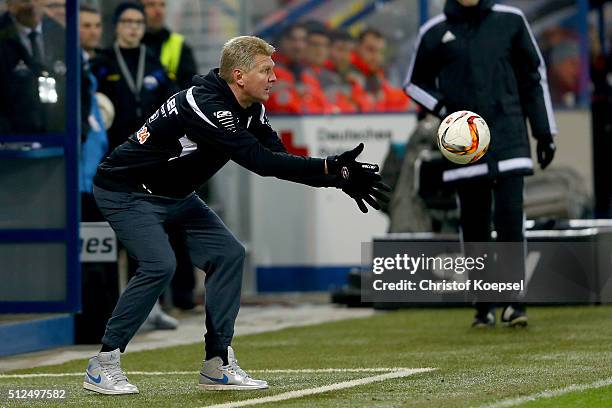 Head coach Stefan Effenberg of Paderborn catches the ball during the 2. Bundesliga match between SC Paderborn and RB Leipzig at Benteler Arena on...
