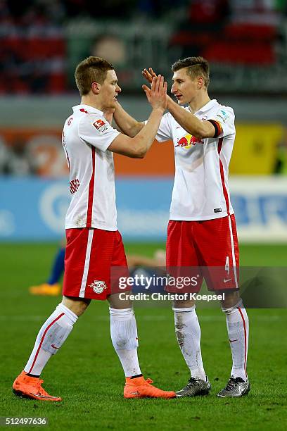 Diego Demme and Willi Orban of Leipzig celebrate after the 2. Bundesliga match between SC Paderborn and RB Leipzig at Benteler Arena on February 26,...