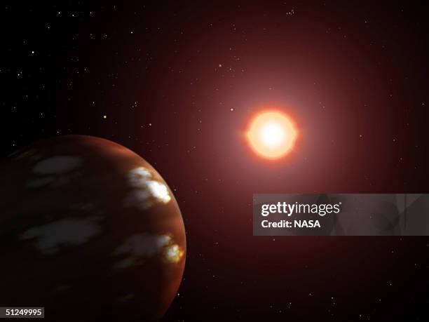 In this handout, an undated illustration shows a representation of a newly discovered Neptune-sized planet orbiting the M dwarf star Gliese 436. This...