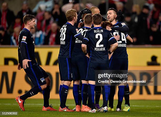 Vedad Ibisevic of Hertha BSC celebrates with team mates as he scores the opening goal during the Bundesliga match between 1. FC Koeln and Hertha BSC...