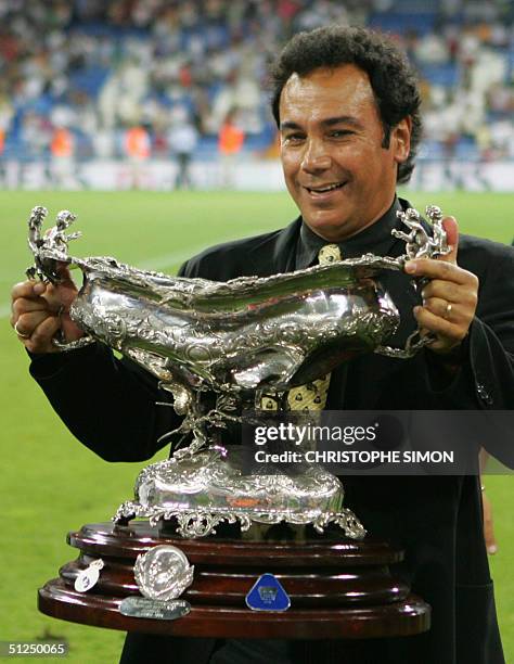 Puma Mexico's coach and former Real Madrid player Hugo Sanchez jubilates after they won the XXVI Santiago Bernabeu Trophy during the friendly...