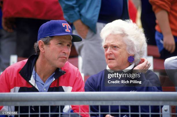 Co-owner and managing general partner of the Texas Rangers George W. Bush and mother Barbara Bush attend a Texas Rangers game circa 1989-1998 in...